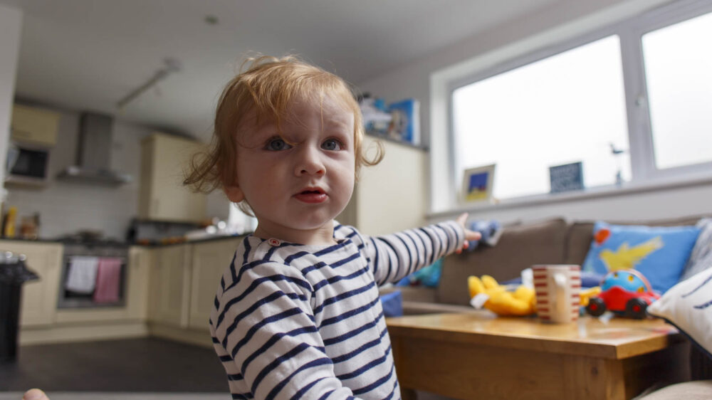 Toddler playing in Harbour View Apartment Lounge St Ives Cornwall