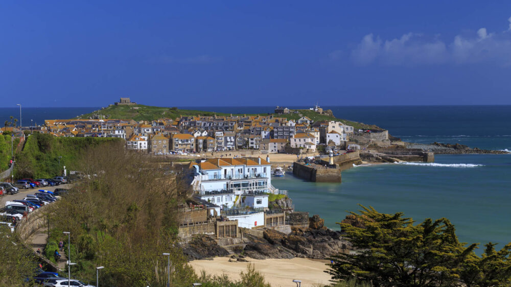 Balcony sea view from Harbour View apartment St Ives Cornwall looking over Porthminster Beach towards the harbour and town